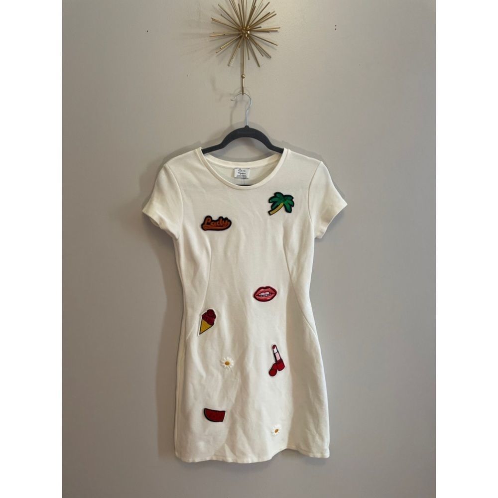 Vintage White Dress with Unique Designs